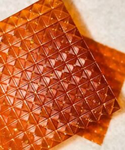 LSD gel tabs 400ug gelatin squares arranged in rows on a blotter sheet
