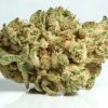 Gorilla Glue #4 GG4 hybrid cannabis flower buds with dense white resin trichome coverage close-up