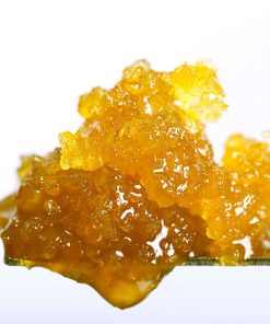 Live resin cannabis concentrate showing rich amber color and thick terpene-rich consistency