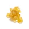 Dark yellow live resin concentrate with sticky malleable texture between wax and sauce consistency