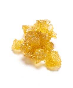 Dark yellow live resin concentrate with sticky malleable texture between wax and sauce consistency