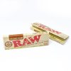 RAW organic hemp rolling papers pack showing unbleached tan paper with cross-weave watermark