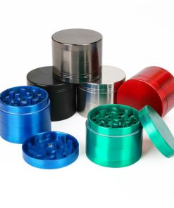 Aluminum herb grinder with magnetic lid shown closed, available in multiple colors