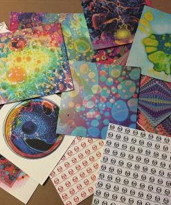 Blue LSD blotter paper with vibrant psychedelic art design