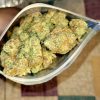 Premium Cinderella 99 cannabis strain in a glass jar, showcased with vibrant green buds.