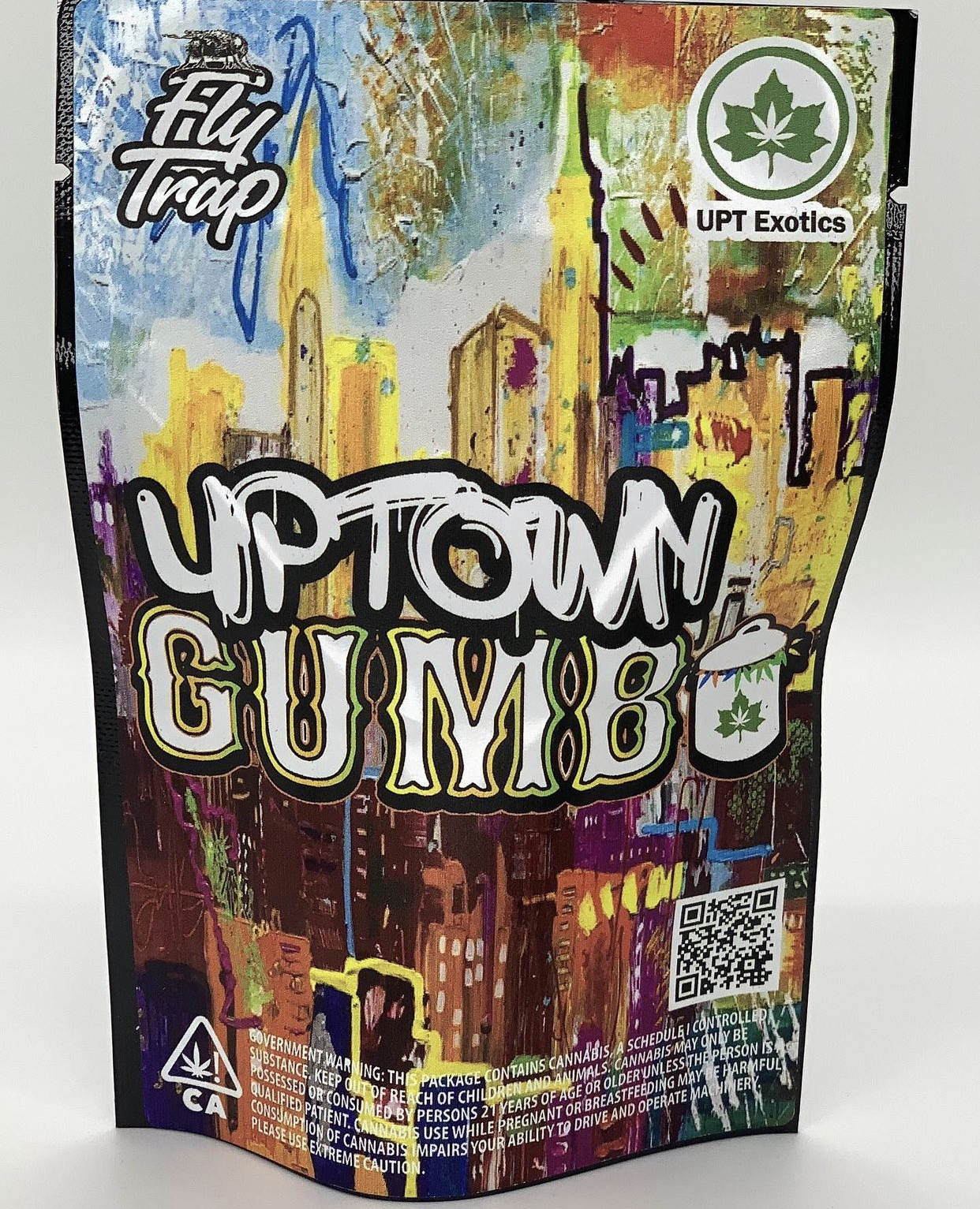 Uptown Gumbo Strain – Indica Hybrid | Florida Gas Packs Uptown Gumbo strain nugs showing purple, blue, and dark green hues with heavy trichome coverage — Florida Gas Packs