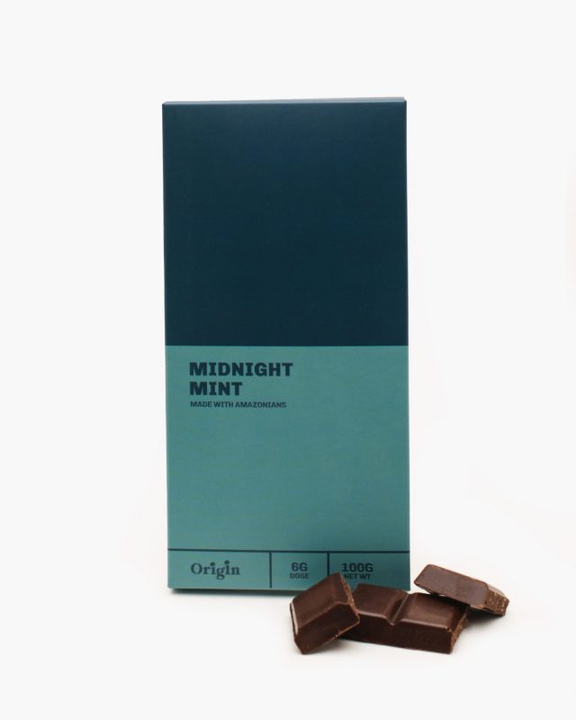 Midnight Mint Dark Chocolate Bar with cacao nibs and peppermint on a dark background, 5mg THC 2mg CBN per piece