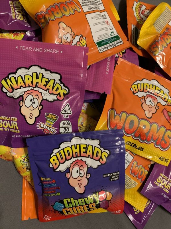 420 Pot Heads 500mg Edible candy pack with bold sour and berry flavor branding on a colorful background