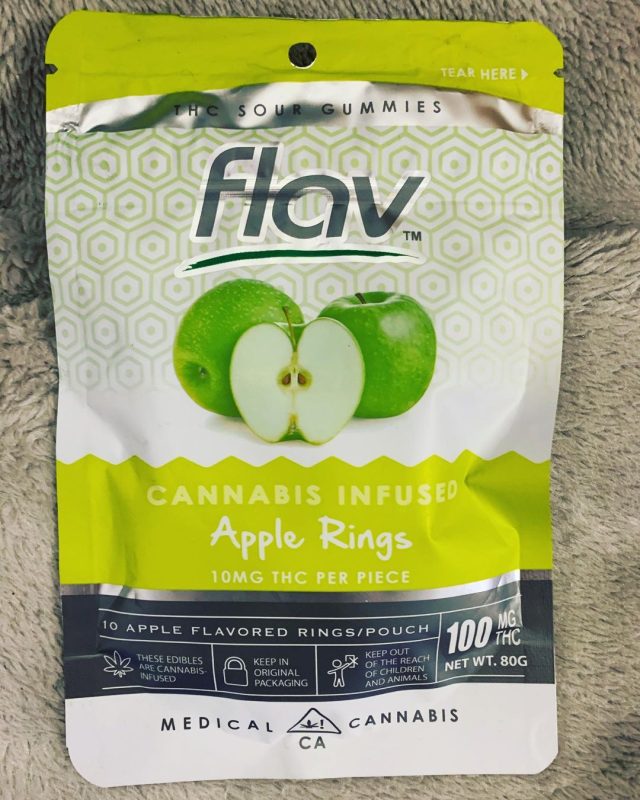 Flav THC Gummies pack showing sugar-coated sour cannabis gummies in colorful flavors, 100mg per pack