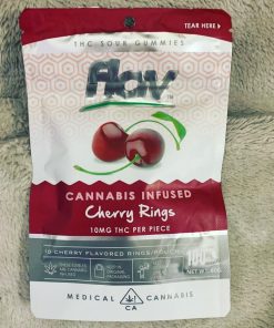 Flav THC Gummies in vibrant citrus packaging, 10mg THC per gummy, vegan & gluten-free.