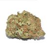 Bubba Kush indica cannabis buds with vivid green and purple coloring coated in amber trichomes